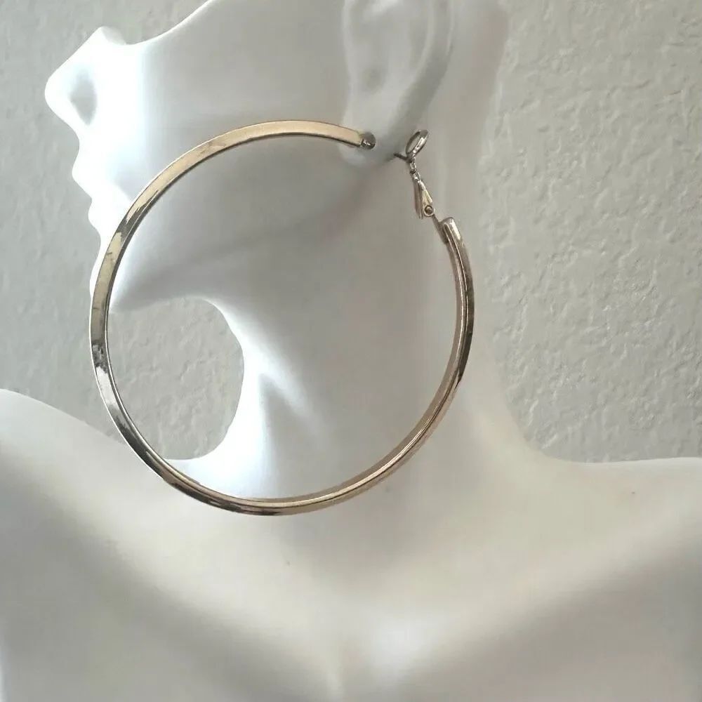 Gold tone large hoop earrings